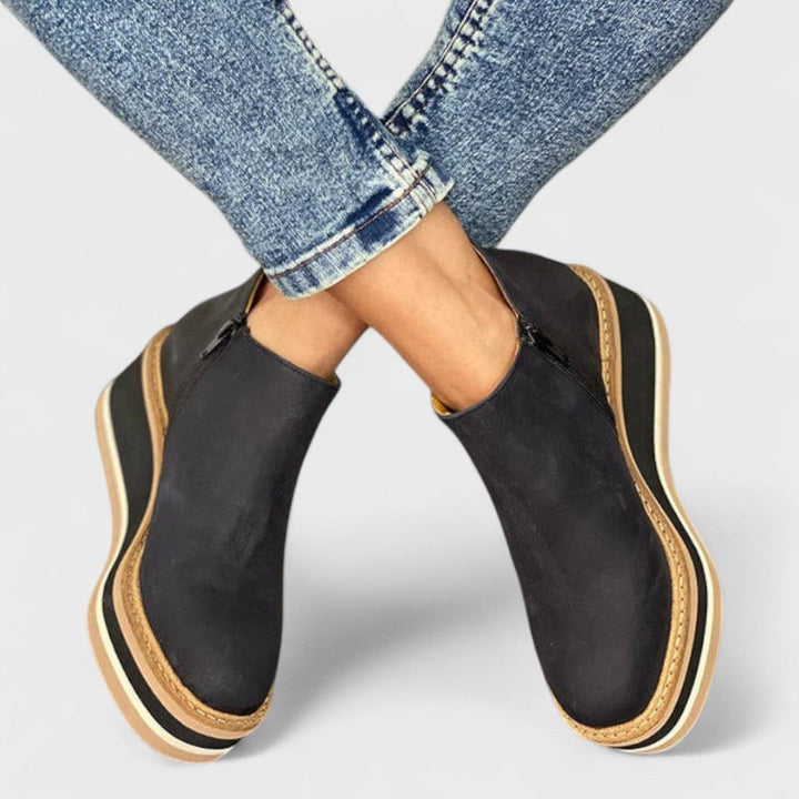 Waterproof side-zip boots in khaki, black, beige, brown and blue with a sleek, elegant silhouette