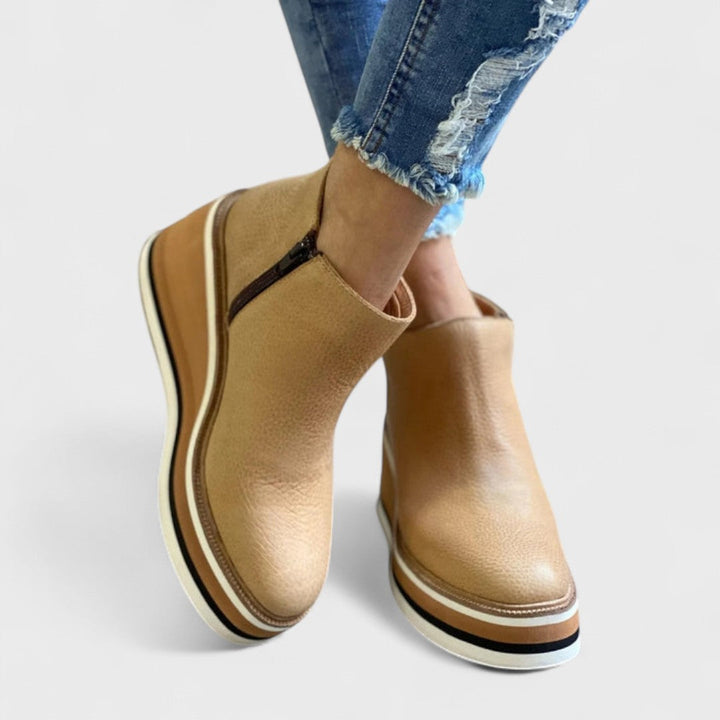 Waterproof side-zip boots in khaki, black, beige, brown and blue with a sleek, elegant silhouette