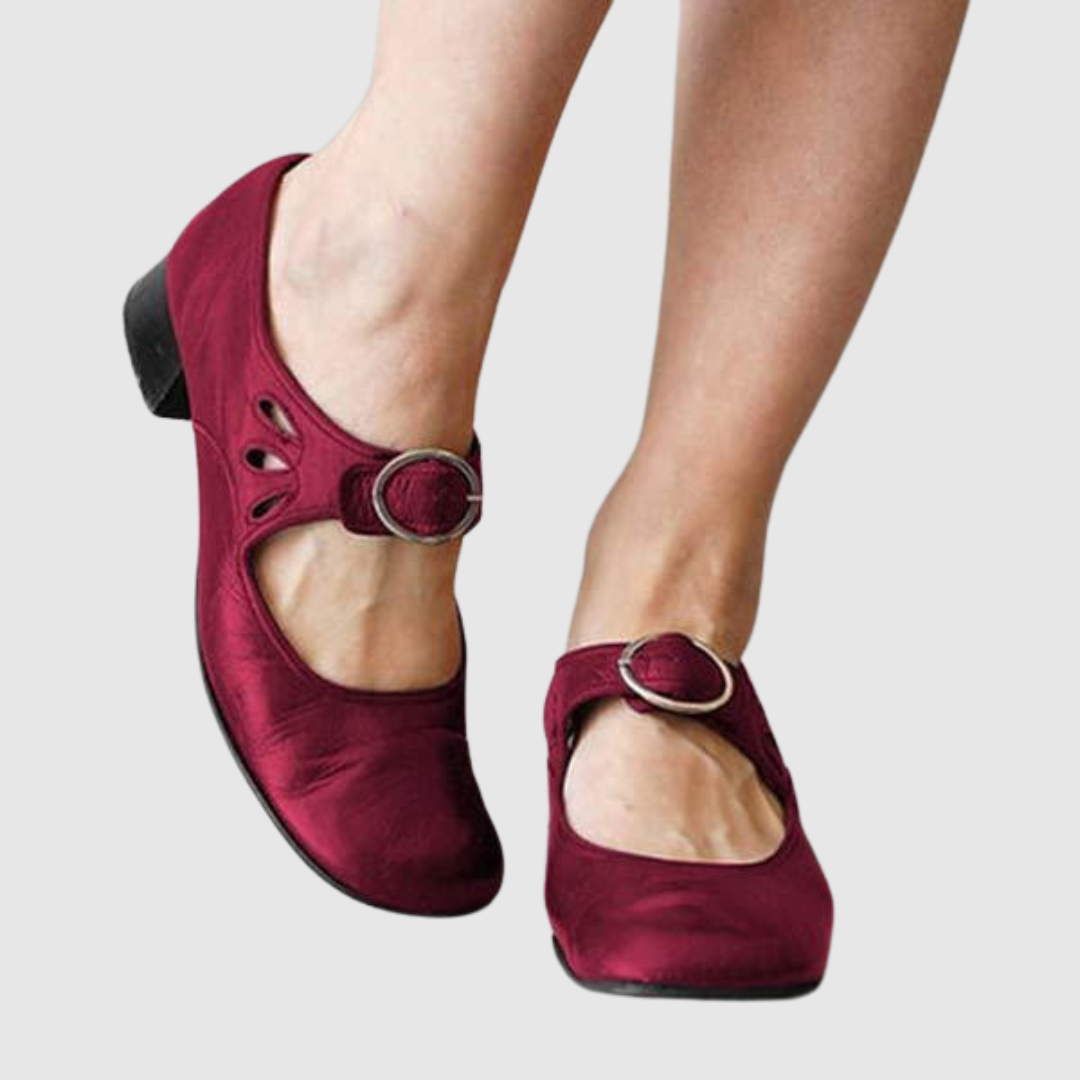 Classic comfort heeled shoes in black, red, brown and blue with a refined silhouette and cushioned sole