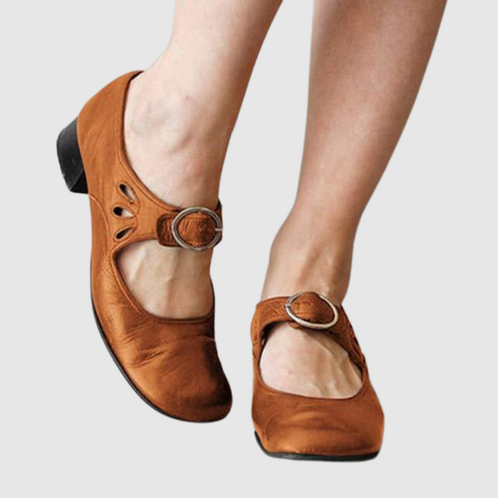 Classic comfort heeled shoes in black, red, brown and blue with a refined silhouette and cushioned sole
