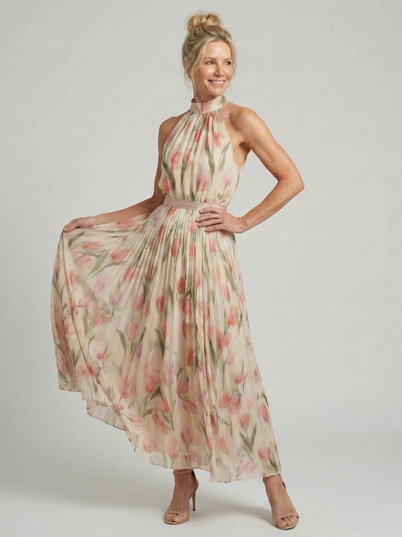 Floral halter-neck midi dress with defined belt waist and flowing relaxed skirt