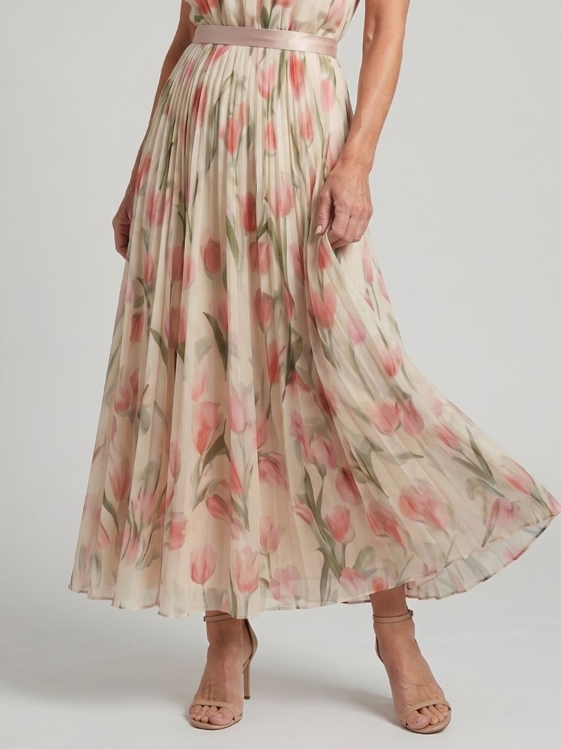 Floral halter-neck midi dress with defined belt waist and flowing relaxed skirt