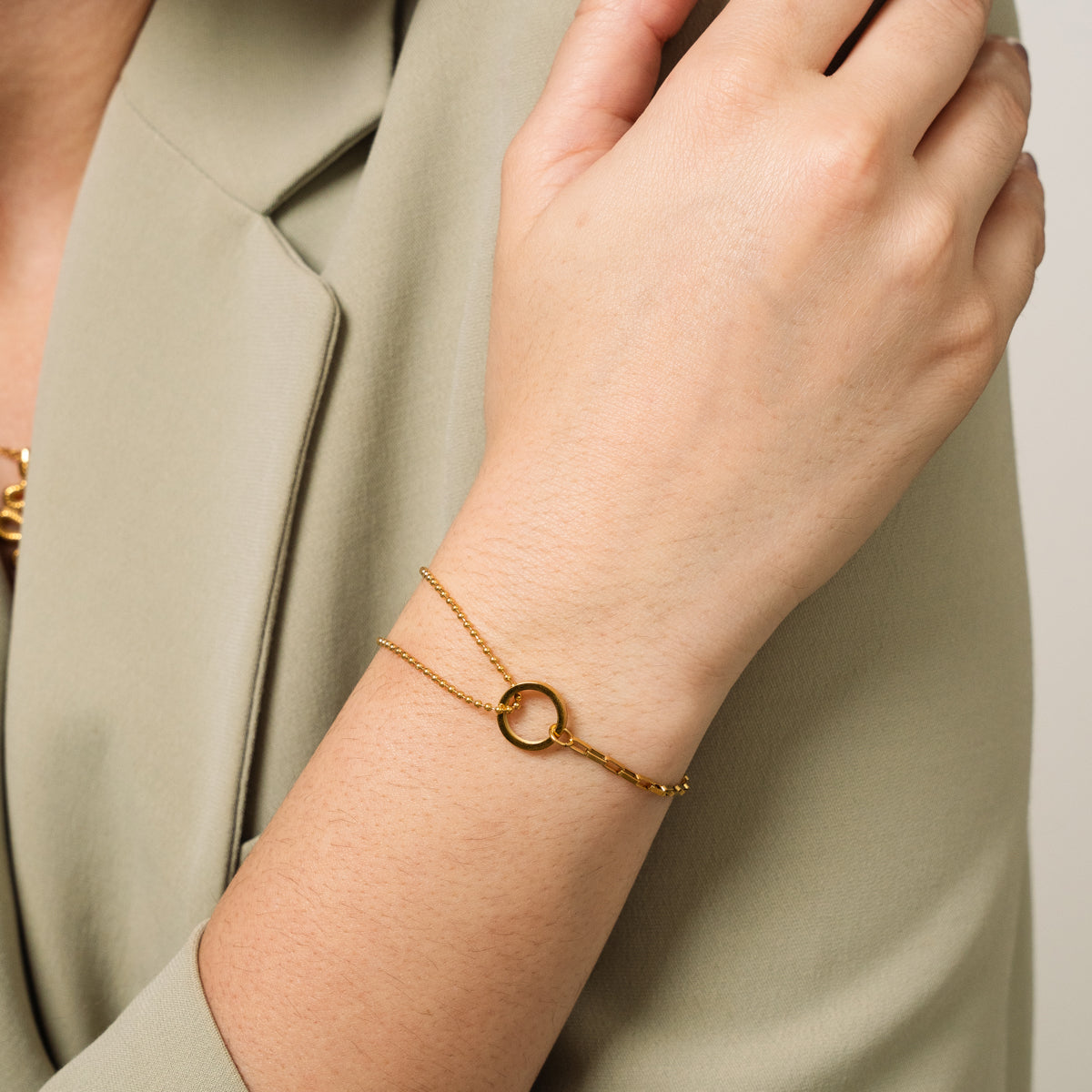 Elegant gold tennis bracelet with row of sparkling stones