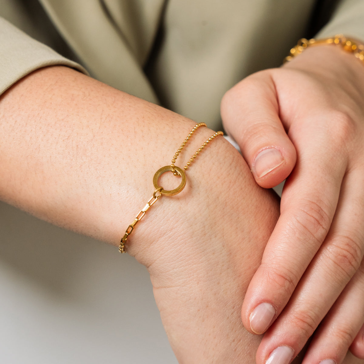 Elegant gold tennis bracelet with row of sparkling stones