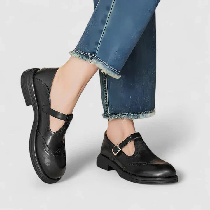 A woman wearing classic strap Mary Jane shoes on an elegant day out.
