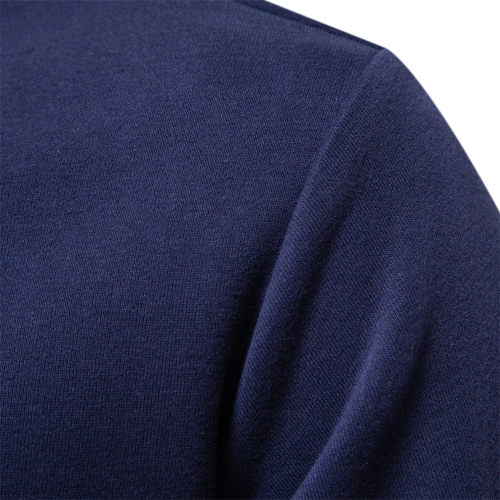 Men's contrast polo jumper in black with classic collar and button placket