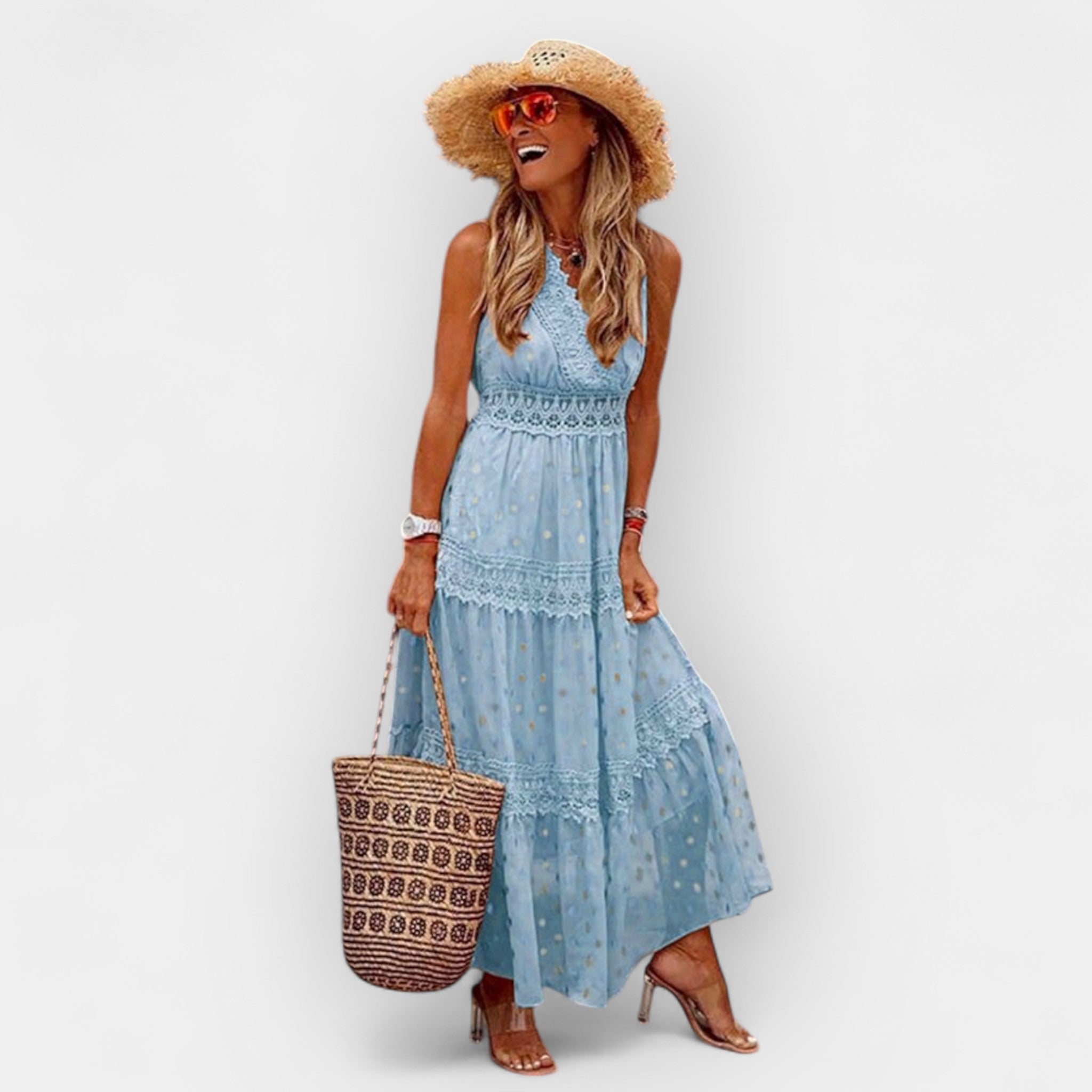 Floaty blue boho summer dress with a relaxed wide silhouette and easy Mediterranean feel