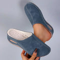 Women's lined cosy clogs in blue, black and brown with a padded interior