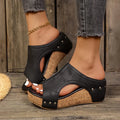 Backless wedge sandals with open-work upper in a natural beige tone