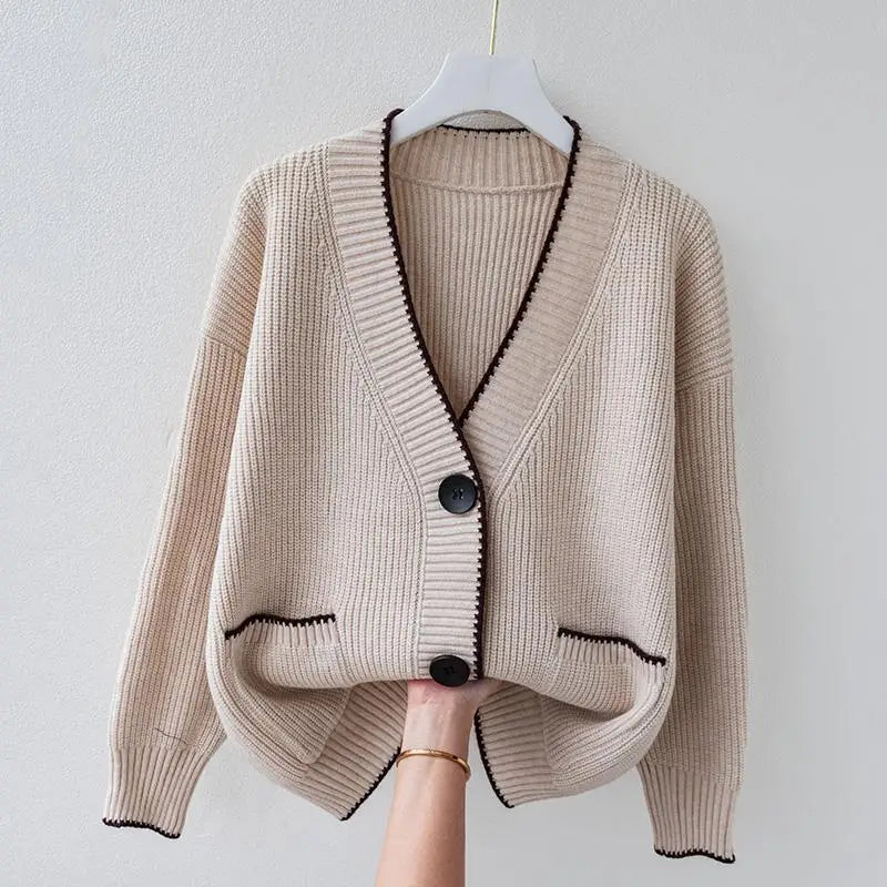 Oversized braided cardigan in beige, orange and navy blue with a relaxed open-front silhouette