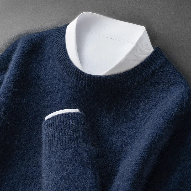 A woman wearing a soft warm jumper layered over a shirt on a cold day.