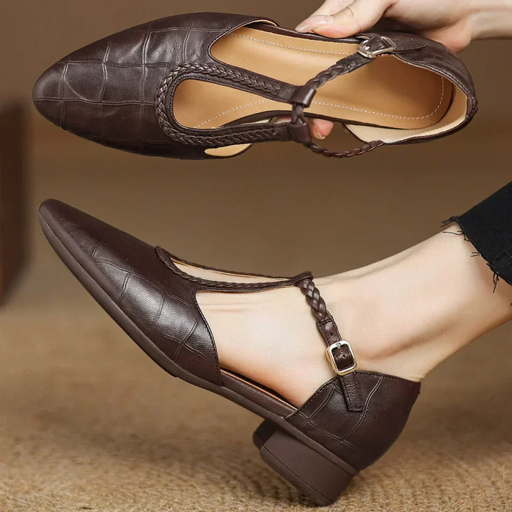 Classic T-bar heeled shoes in brown and black with a braided strap detail
