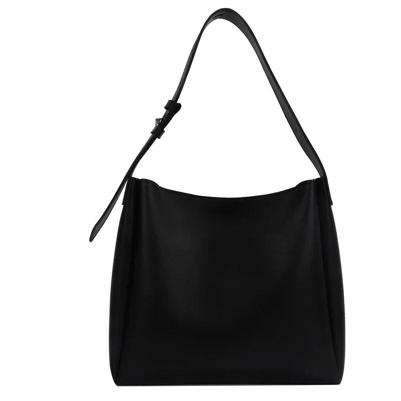 Elegant structured tote bag in black with clean minimalist lines and comfortable shoulder strap