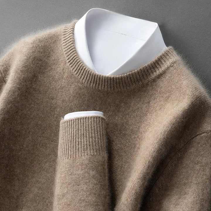 A woman wearing a soft warm jumper layered over a shirt on a cold day.