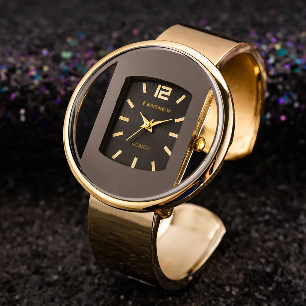 Women's bold watch with black dial and warm gold accent details