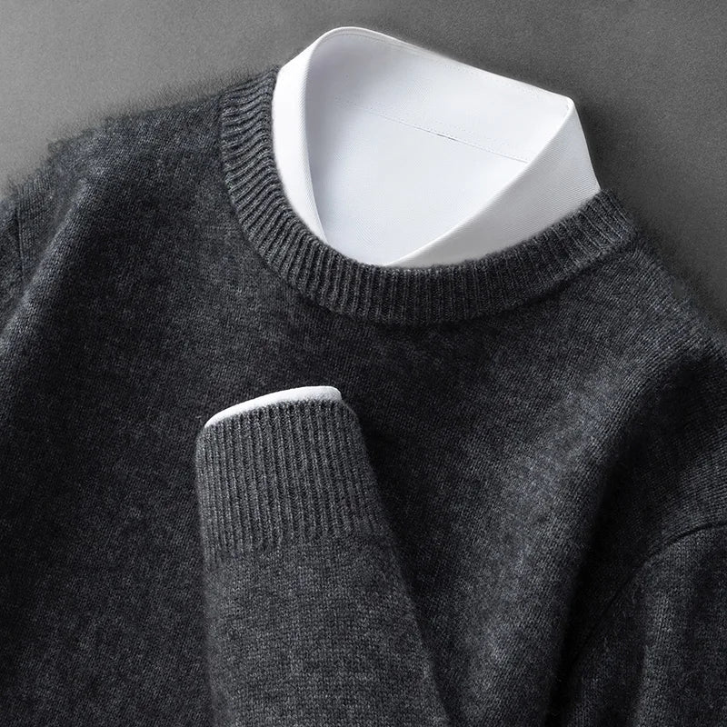 A woman wearing a soft warm jumper layered over a shirt on a cold day.