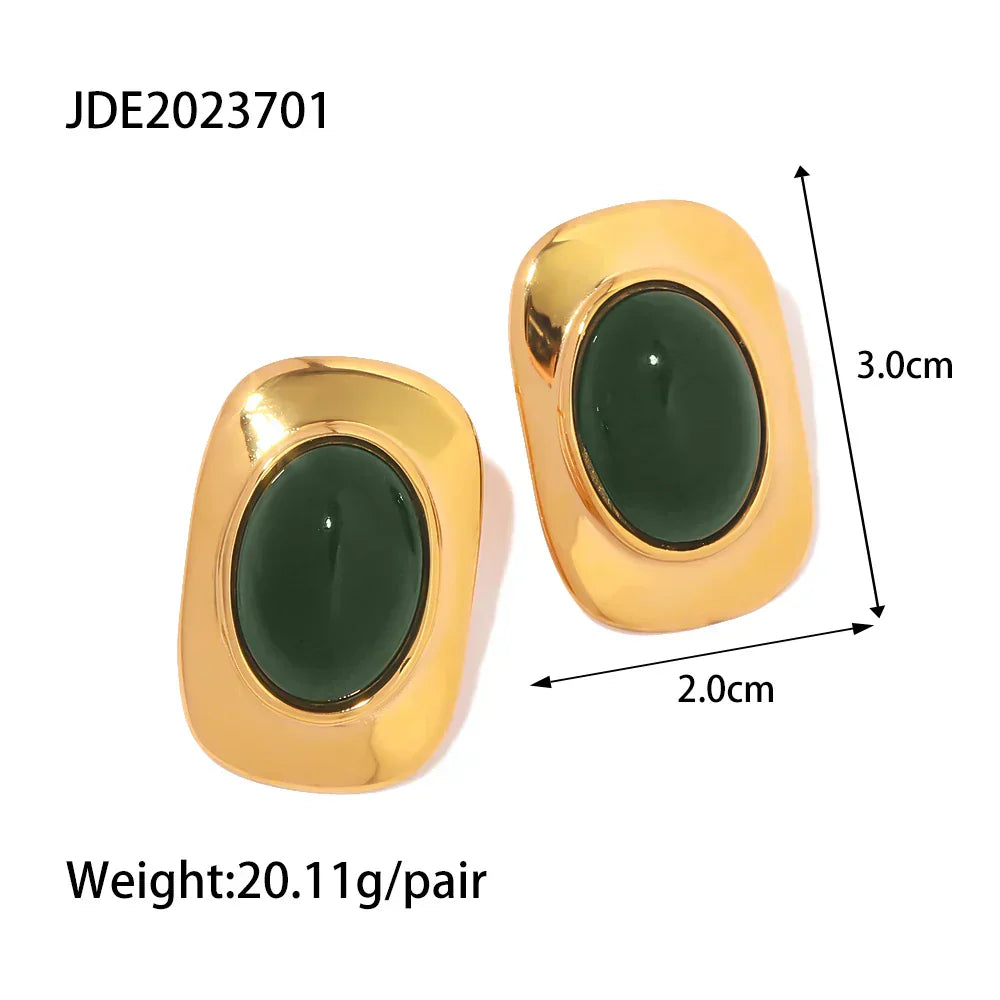 A pair of handcrafted oval drop earrings featuring a natural green opal stone with shifting colour