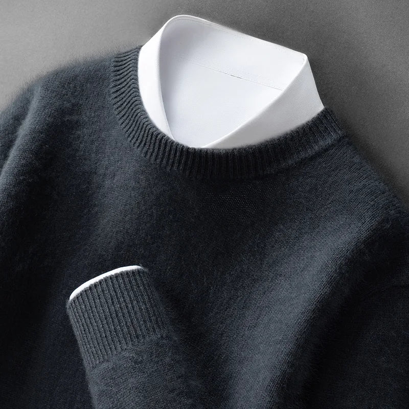 A woman wearing a soft warm jumper layered over a shirt on a cold day.