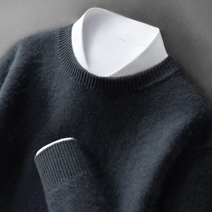 A woman wearing a soft warm jumper layered over a shirt on a cold day.