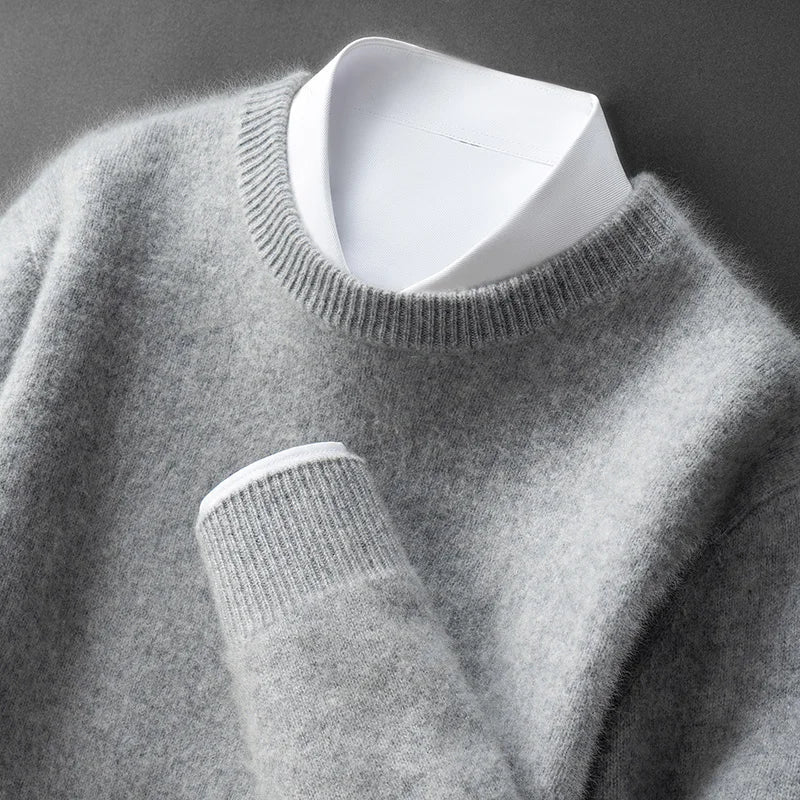 A woman wearing a soft warm jumper layered over a shirt on a cold day.