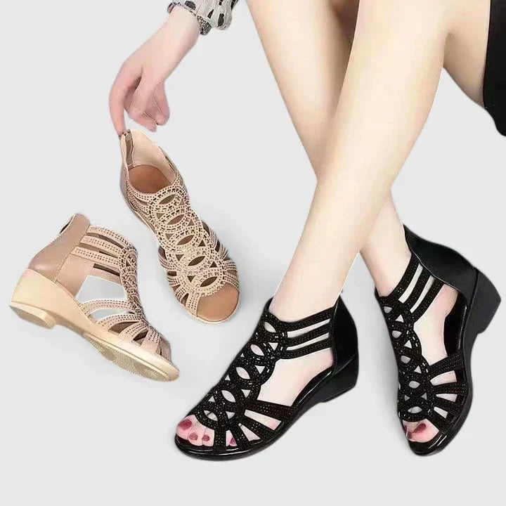 A woman moving freely in wide-fit slip-on comfort sandals with a cushioned footbed.