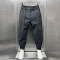 Men's classic pleated dress trousers in grey with a clean tailored silhouette