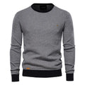 Men's diamond-pattern jumper in black with embroidered detailing and a clean regular fit