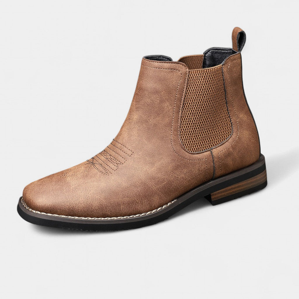Men's brown smart Chelsea boots with elastic side panels and a sturdy structured sole