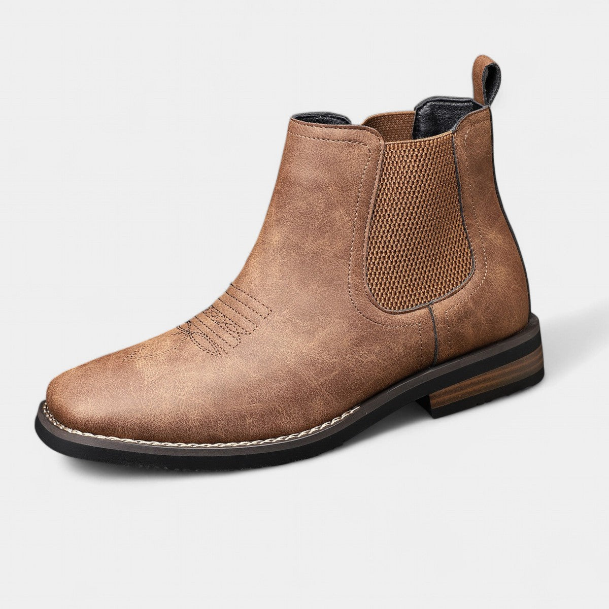 Men's brown smart Chelsea boots with elastic side panels and a sturdy structured sole