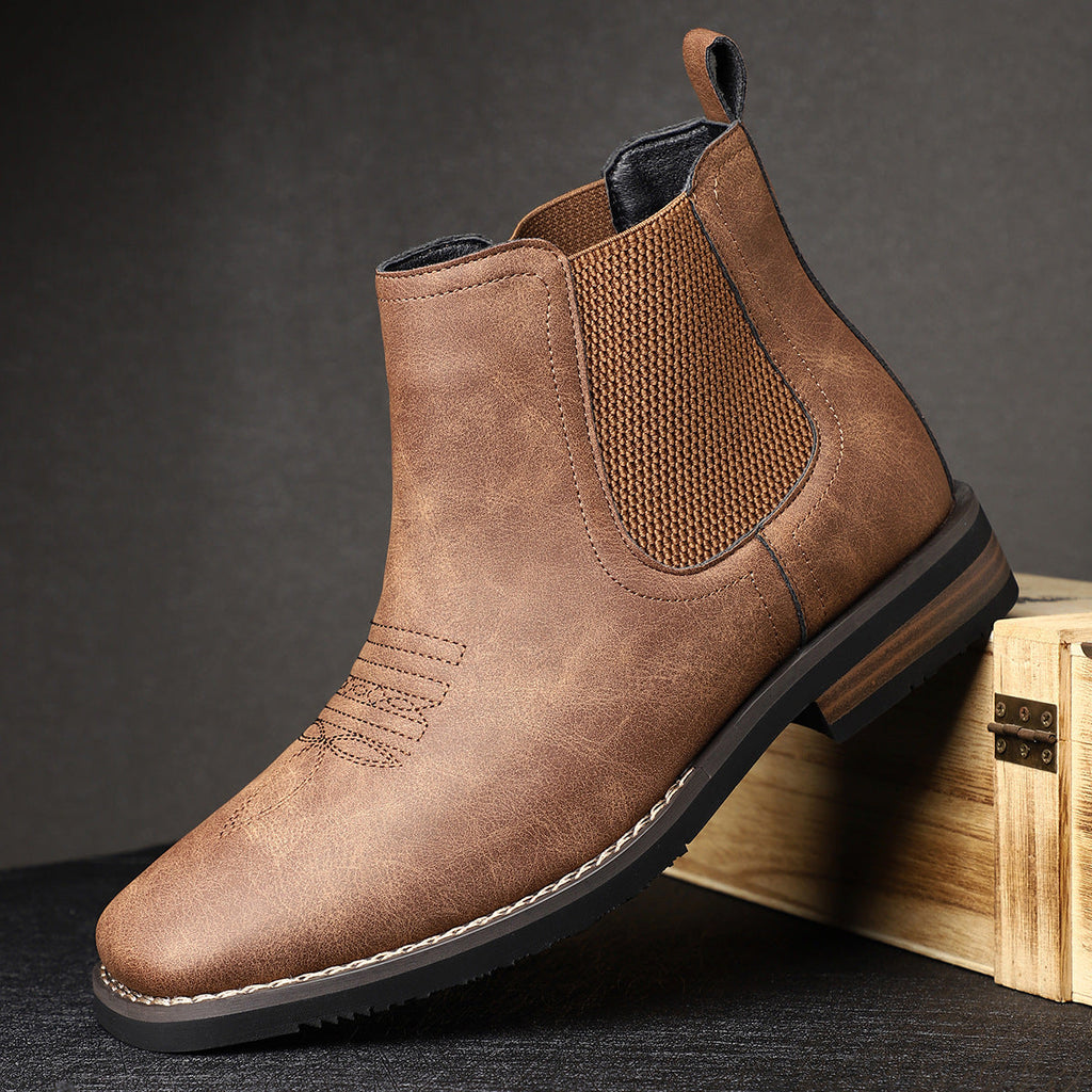 Men's brown smart Chelsea boots with elastic side panels and a sturdy structured sole