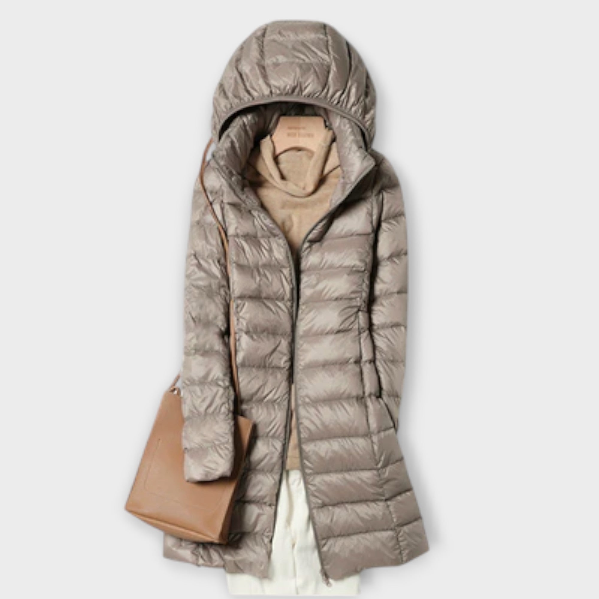 Ultralight padded coat in champagne, blue, pink and black with a sleek, modern silhouette