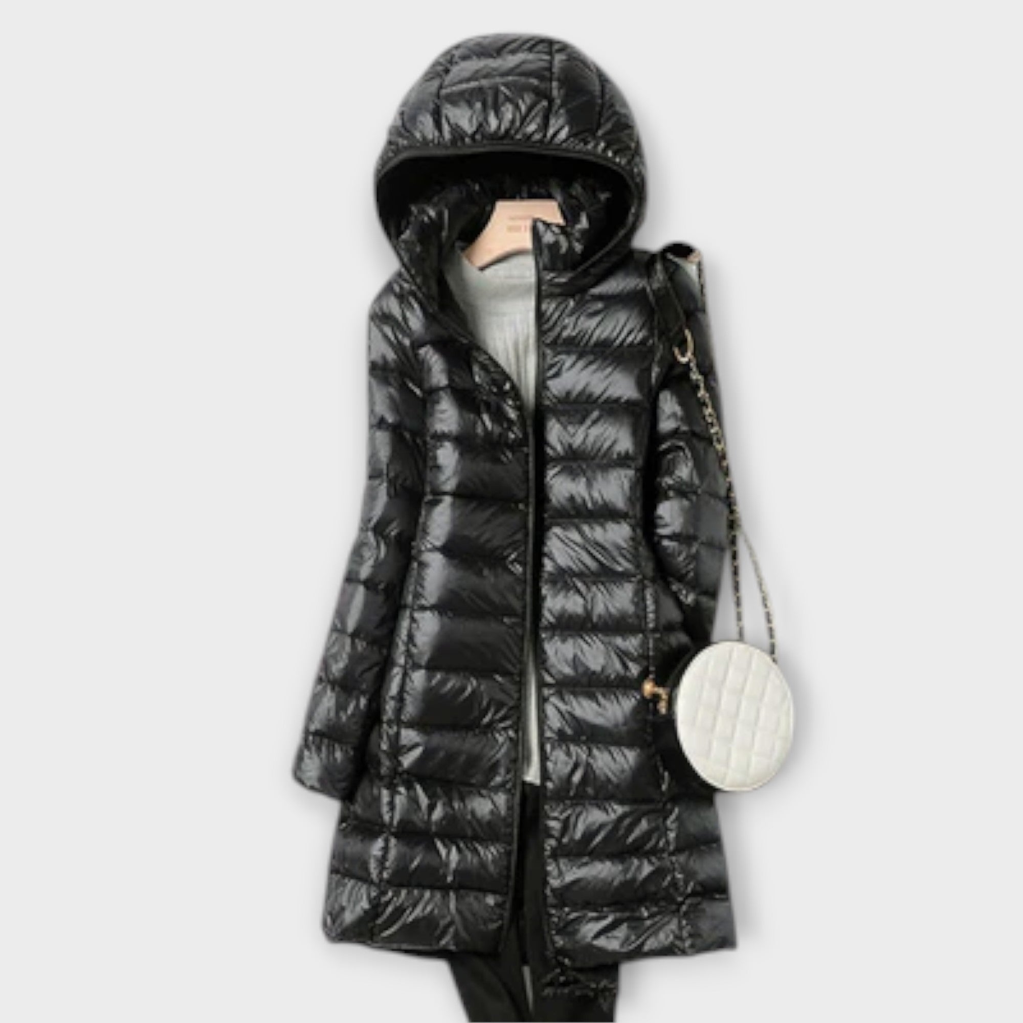 Ultralight padded coat in champagne, blue, pink and black with a sleek, modern silhouette