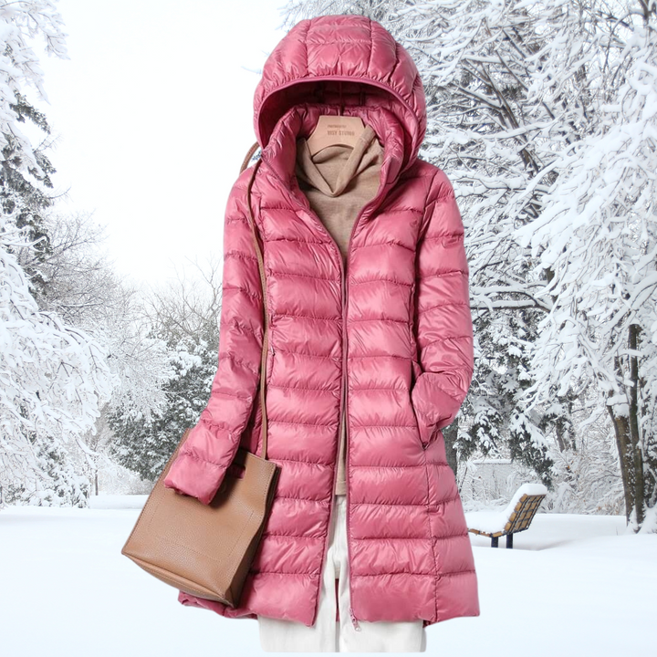 A rail of ultra-light padded hooded coats in pink, red, khaki and black, knee-skimming in length.