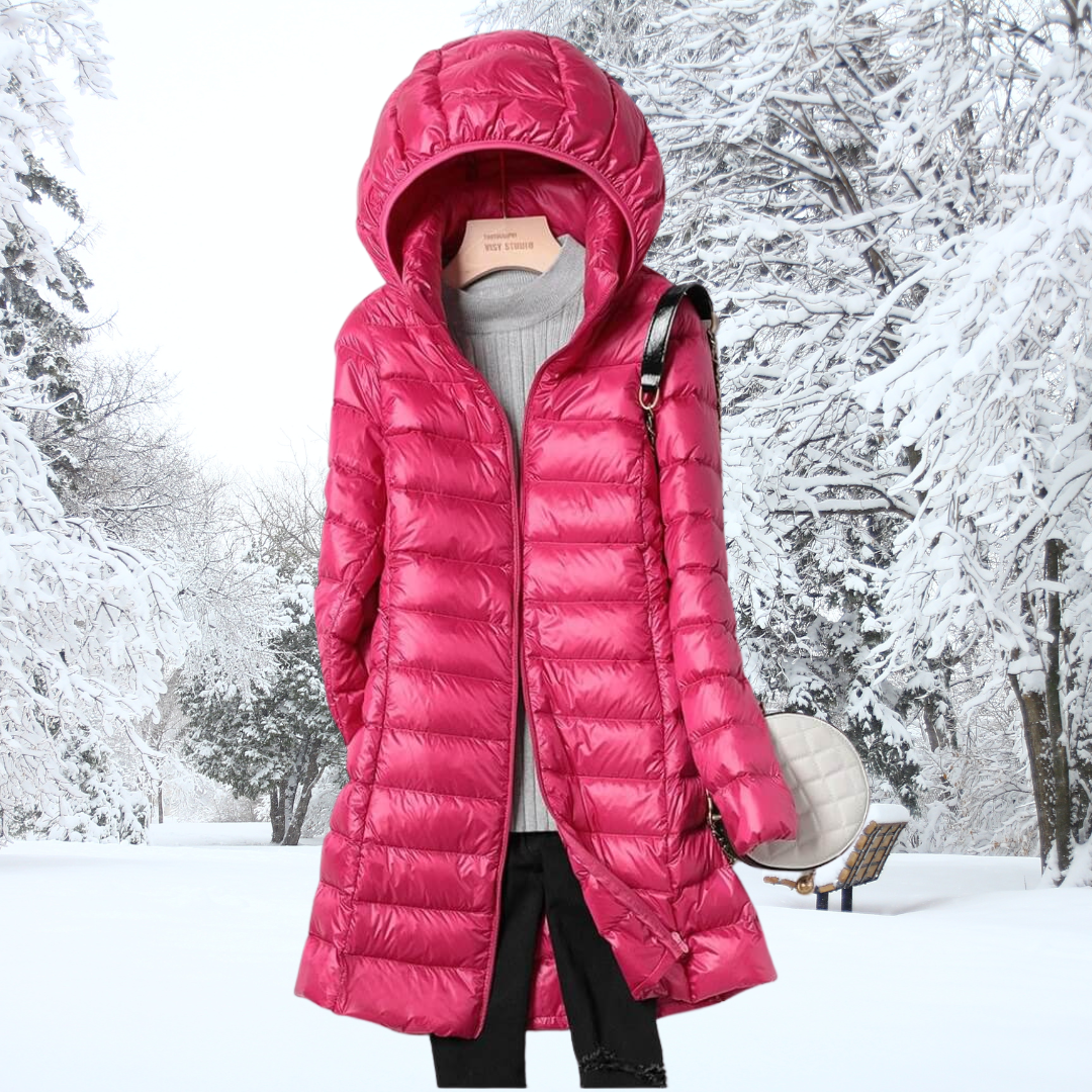 A woman wearing a lightweight weatherproof jacket with a detachable hood on a changeable day.