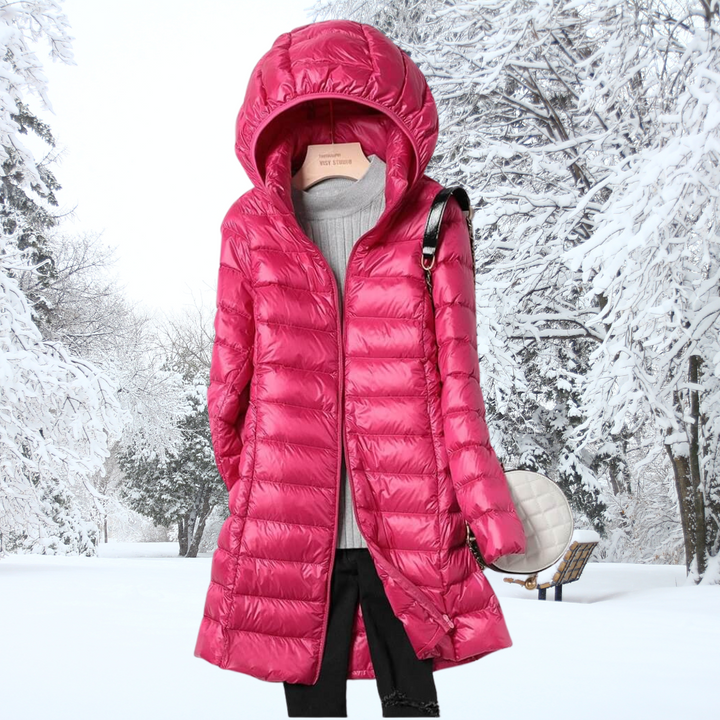 A rail of ultra-light padded hooded coats in pink, red, khaki and black, knee-skimming in length.