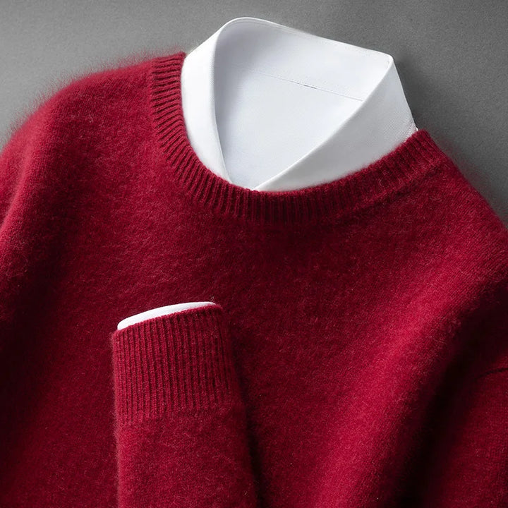 A woman wearing a soft warm jumper layered over a shirt on a cold day.