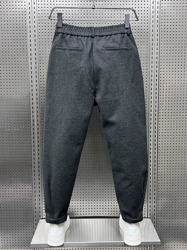 Men's classic pleated dress trousers in grey with a clean tailored silhouette