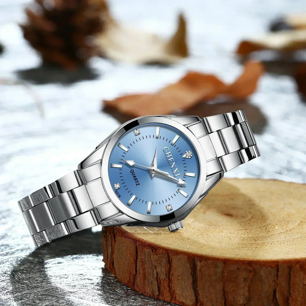 Women's stainless steel classic watch in pale blue with a minimal polished face