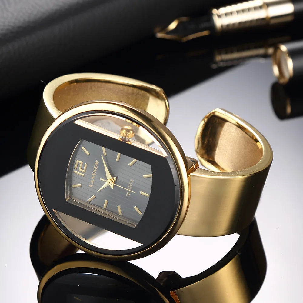 Women's bold watch with black dial and warm gold accent details