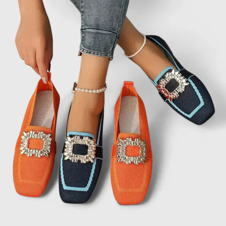A woman relaxing at home in soft supportive house slippers