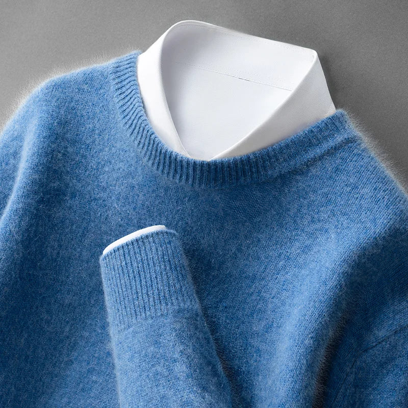 A woman wearing a soft warm jumper layered over a shirt on a cold day.