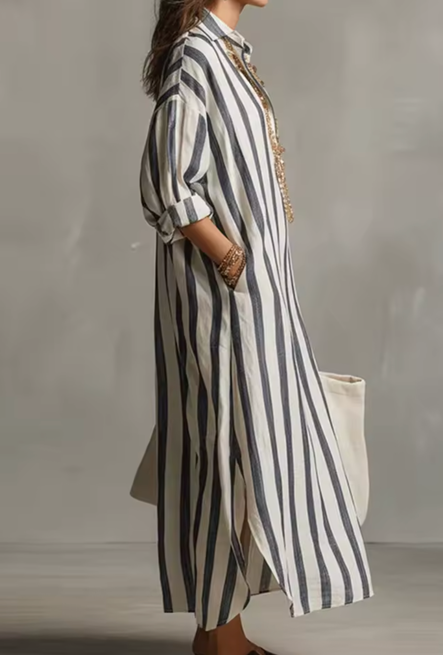Women's striped maxi dress in pink and white with a classic shirt collar and flowing silhouette
