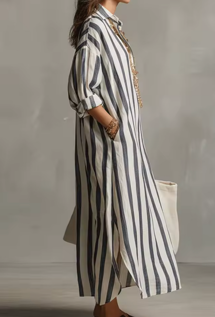 Women's striped maxi dress in pink and white with a classic shirt collar and flowing silhouette