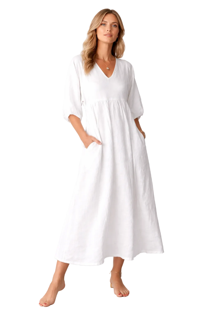 Floaty maxi dress in white, also available in black, with a soft V-neckline and side pockets