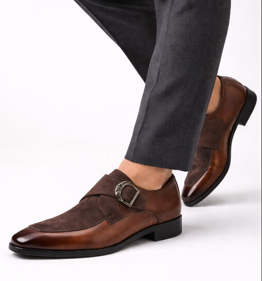 Men's brown monk strap shoes with a refined strap buckle and clean structured silhouette