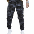 Men's slim-fit camo trousers in military green with side pockets and elasticated waist