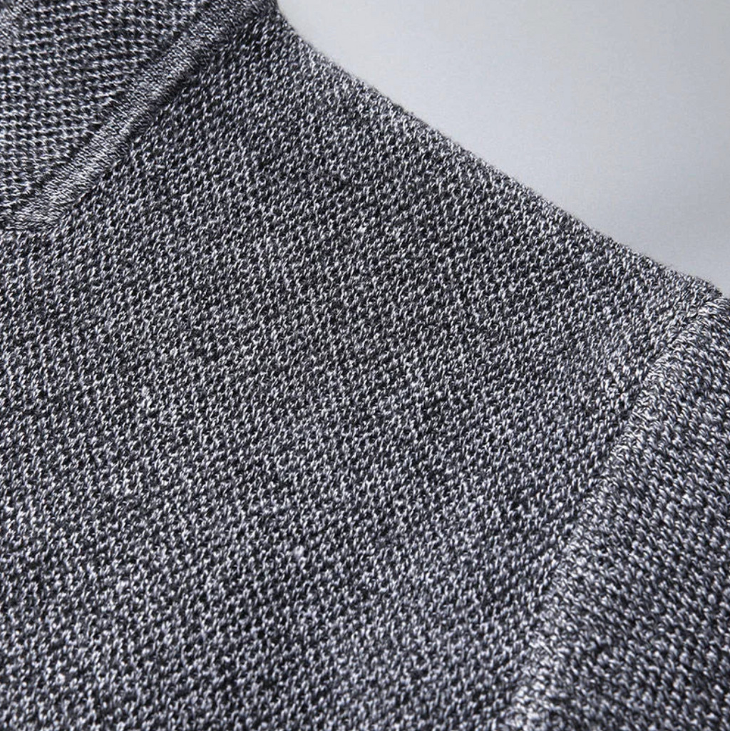 Men's minimal button-up overshirt in grey with a stand collar and structured texture