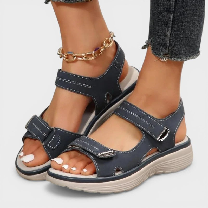 Cushioned comfort sandals in beige and black with adjustable velcro straps