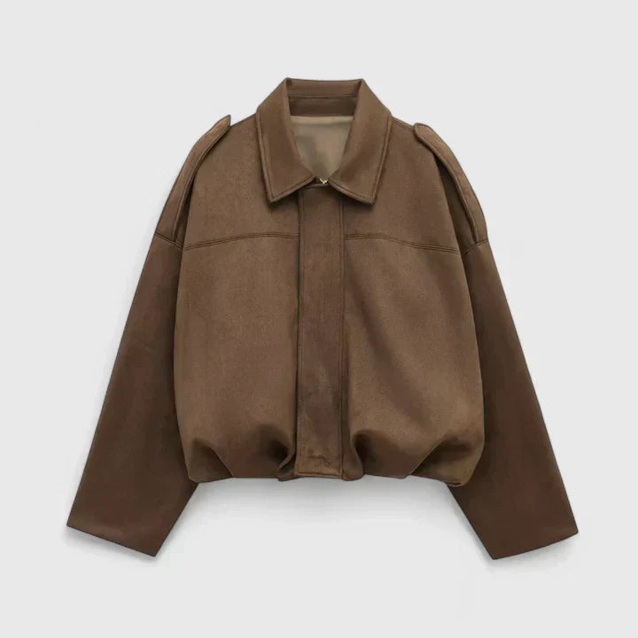 A woman wearing a classic versatile jacket, styled for a smart-casual day out.