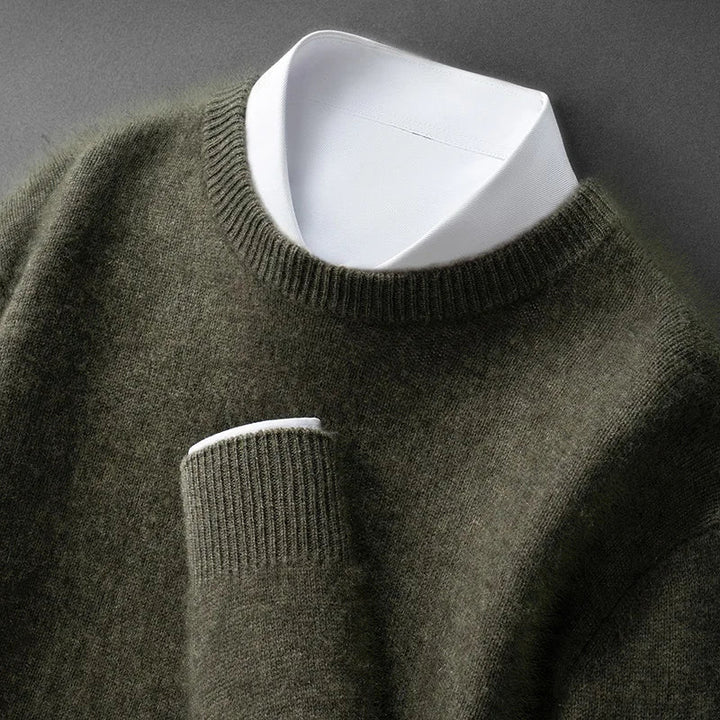 A woman wearing a soft warm jumper layered over a shirt on a cold day.